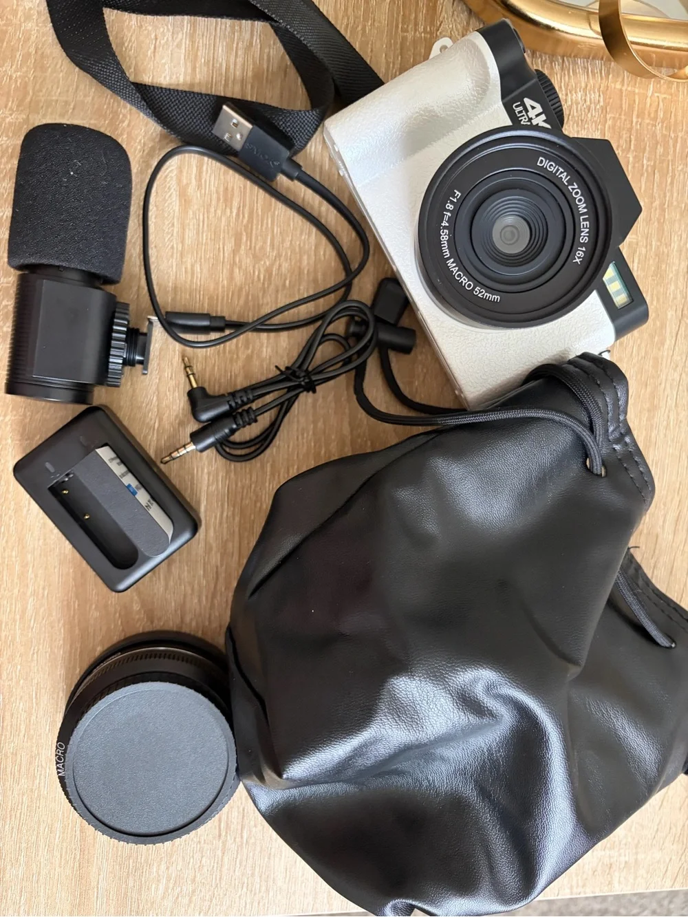 Compact White and Black Digital Camera with Zoom Lens